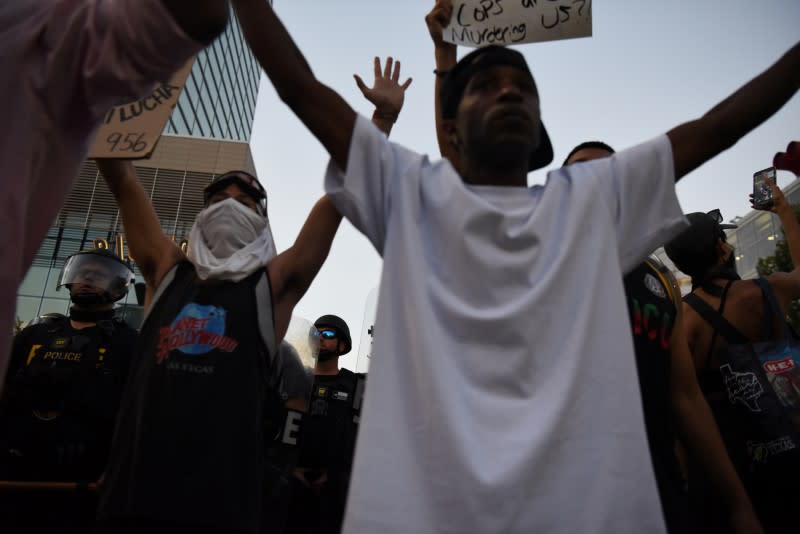 Protesters gather against the death in Minneapolis police custody of George Floyd, in Houston