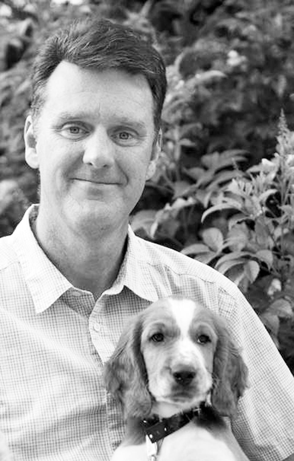 In this undated image provided by Lauren Halpern shows dog trainer Steve Haynes. Haynes of Fidelio Dog Works in Austin, Texas, trains as many as 500 dogs a year all over the country. The go-to dog right now seems to be the cava-poo-chon, he said. The breed is the newest and latest in the decades-old search for the dog-face fountain of youth and perfect pet accessory. But the American Kennel Club doesn't recognize the new trend as an official breed, and one expert calls some specially bred small dogs expensive "gimmicks." (AP Photo/Courtesy Lauren Halpern)