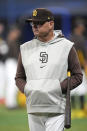 San Diego Padres manager Mike Shildt looks his players during a baseball workout at the Gocheok Sky Dome in Seoul, South Korea, Tuesday, March 19, 2024. Major League Baseball's season-opening games between the Los Angeles Dodgers and San Diego Padres in Seoul will be the first MLB games held in the baseball-loving nation.(AP Photo/Lee Jin-man)