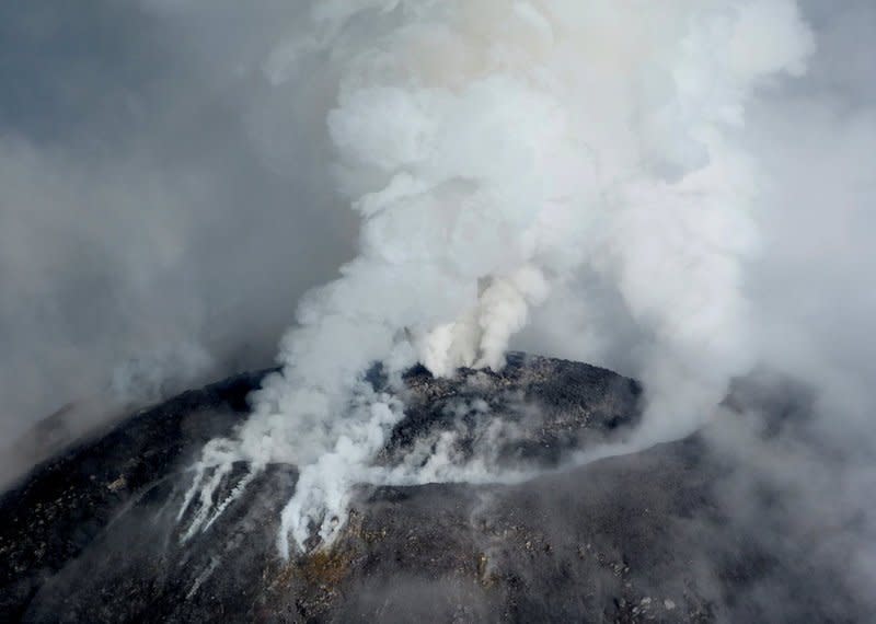 An aerial view shows the crater of the Mexican Colima or