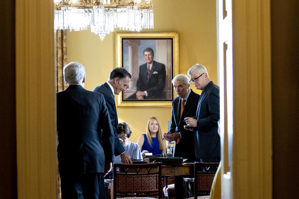 Senate Minority Leader Mitch McConnell meets with Senators Mitt Romney, Susan Collins, Rob Portman, Bill Cassidy and Lisa Murkowski gather in McConnell's office at the Capitol on Wednesday, July 28, 2021. / Credit: Stefani Reynolds/Bloomberg via Getty Images