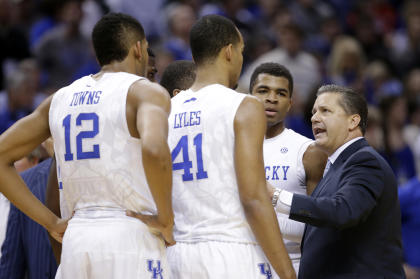 Kentucky coach John Calipari (right) has a veteran, athletic team that embraces defense. (AP)