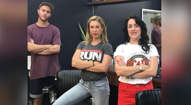 Joy Arnott (centre) has defended her barbershop's men-only policy. Photo: Facebook/ Star Barber Darwin