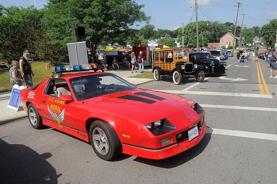 A large crowd came to downtown Ashland Saturday to enjoy the annual Dream Cruise and Car Show along with the sunshine and pleasant temperatures.