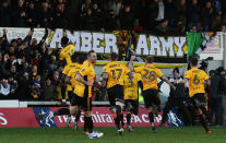 Soccer Football - FA Cup Third Round - Newport County AFC vs Leeds United - Rodney Parade, Newport, Britain - January 7, 2018 Newport County's Shawn McCoulsky celebrates scoring their second goal with team mates REUTERS/Rebecca Naden