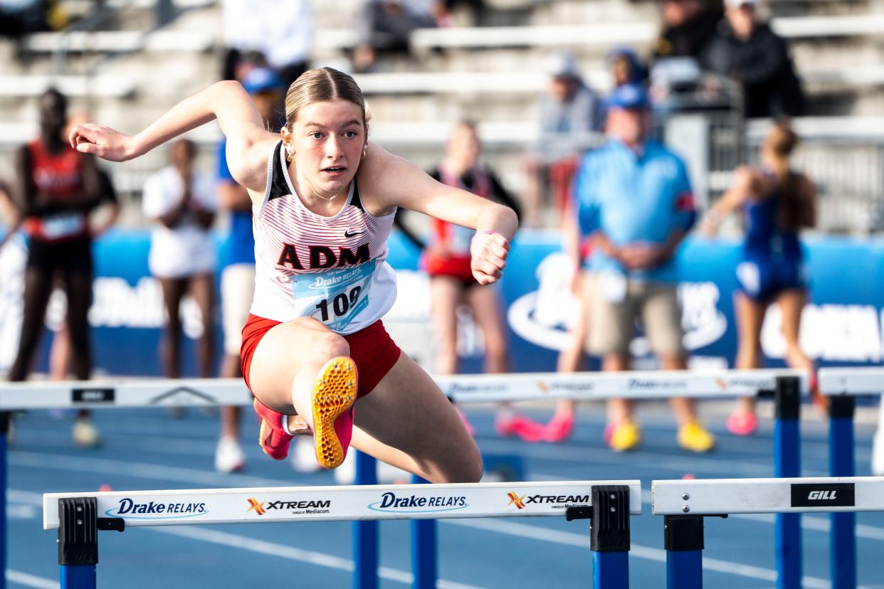 ADM's Elise Coghlan competes in the 100 meter shuttle hurdle relay preliminary races during the Drake Relays at Drake Stadium on Saturday, April 27, 2024, in Des Moines.