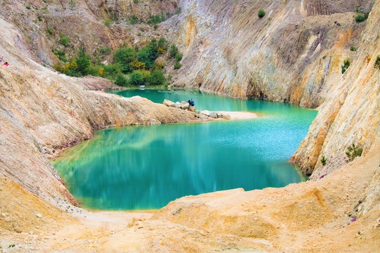 Instagram users have ended up hospitalised after trying to get the perfect shot at an “idyllic” lake in northwest Spain that is full of toxic chemicals.Monte Neme in the Galicia region has attracted droves of tourists in recent years thanks to its bright turquoise waters.But the site is actually a water-filled disused quarry connected to what was once a Tungsten mine, and the distinctive blue colour of the water is due to chemical contamination.While most selfie-takers are content with getting a snap next to the pool, some have taken the extra step of going for a dip to get the perfect shot – with dire consequences. One Instagrammer told Spanish news outlet Publico that after coming into contact with the water, she had suffered vomiting and come out in a rash that lasted a fortnight.> View this post on Instagram> > Fotito del primer día, dándome un refresco en el Neme. 50.000 frikazos han visto mi último stories. Estáis muy mal. De momento, como un roble. A ver si hace solecito este finde y sumamos el tercer remojo ya, que apetece. wolframiomiscojones melapelaelneme viscacatalunya catalunyalliure bulode4galegos> > A post shared by Selección natural (@izzyandtai) on Jul 16, 2019 at 6:41am PDTThe news site reported that more than one tourist has been hospitalised for “damage to the skin and digestive system” after visiting Monte Neme.While brief exposure will most likely cause eye and skin irritation, spending more time in the contaminated water and ingesting the toxins could cause stomach problems, vomiting and diarrhoea, Manuel Ferreiro, a doctor at the University hospital in nearby A Coruña, told European news site The Local.But even this won’t put off the most dedicated “influencers” – an Instagrammer called Uxía told Publico that “the picture was worth it” despite contracting a rash.The mine was abandoned in the 1980s, but was formerly used to extract Tungsten, a key component in the manufacture of light bulbs and for hardening steel, during the Second World War under General Francisco Franco.It’s not the first time social media users have been lured to a toxic site by the promise of ethereal pictures.A beautiful turquoise lake that is a popular selfie spot in Russia was recently revealed to be a toxic waste dump.The man-made lake in the city of Novosibirsk has attracted hundreds of Instagram users thanks to its vibrant blue hue. But, according to the Siberian Generating Company, which owns the lake, it’s actually an ash dump from a local coal plant and contact with the water should be avoided at all costs.