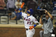 New York Mets' Javier Baez (23) gestures after hitting a home run during the ninth inning of a baseball game against the St. Louis Cardinals Tuesday, Sept. 14, 2021, in New York. (AP Photo/Frank Franklin II)