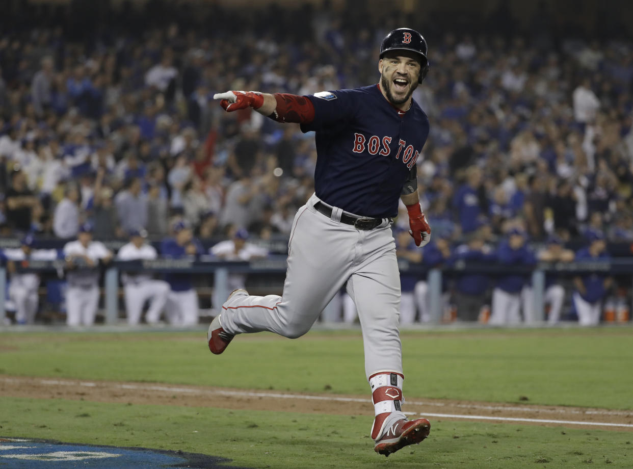 Boston Red Sox’s Steve Pearce celebrates his second home run during the eighth inning in Game 5 of the World Series baseball game against the Los Angeles Dodgers on Sunday, Oct. 28, 2018, in Los Angeles. (AP Photo/David J. Phillip)