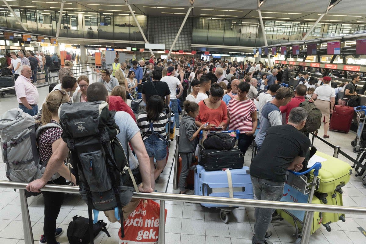 Queues at Schiphol airport in 2017 (AFP via Getty)