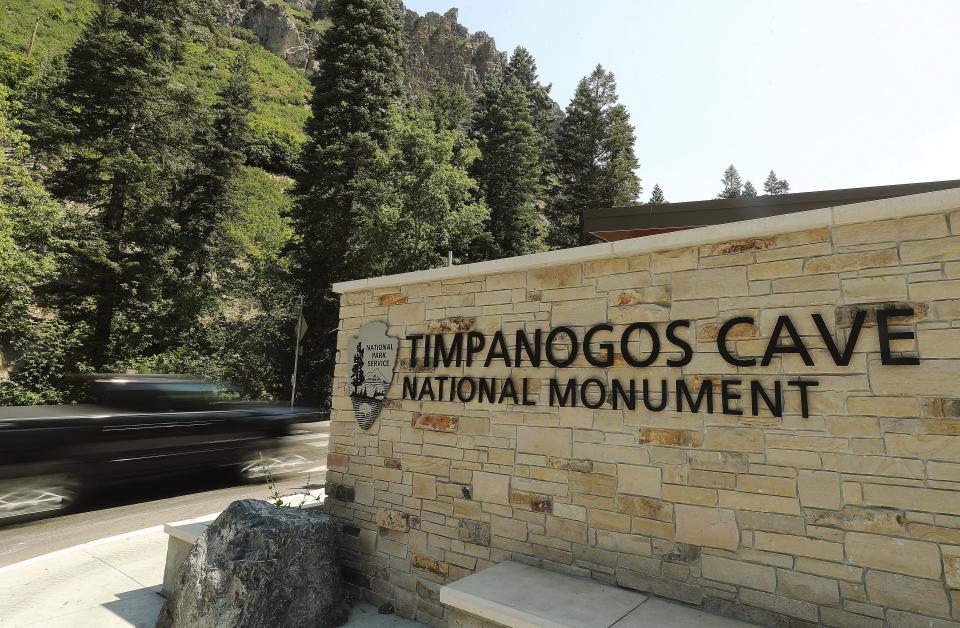 A motorists drives past the Timpanogos Cave National Monument sign in American Fork Canyon on Tuesday, July 21, 2020. Visits to all national parks in Utah this summer are drastically down with the exception of Timpanogos Cave. | Jeffrey D. Allred, Deseret News