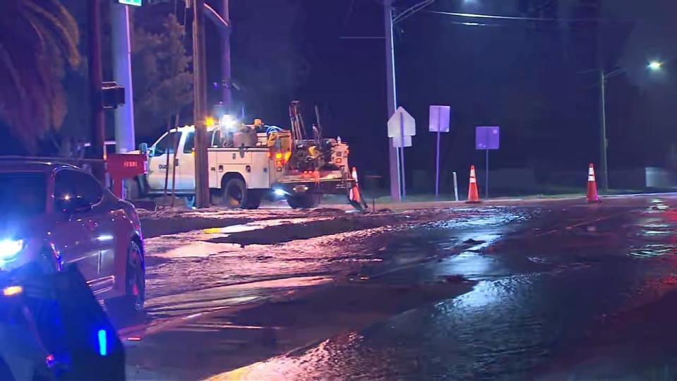 Officials said a truck struck a fire hydrant, causing flooding on streets and to at least one home.