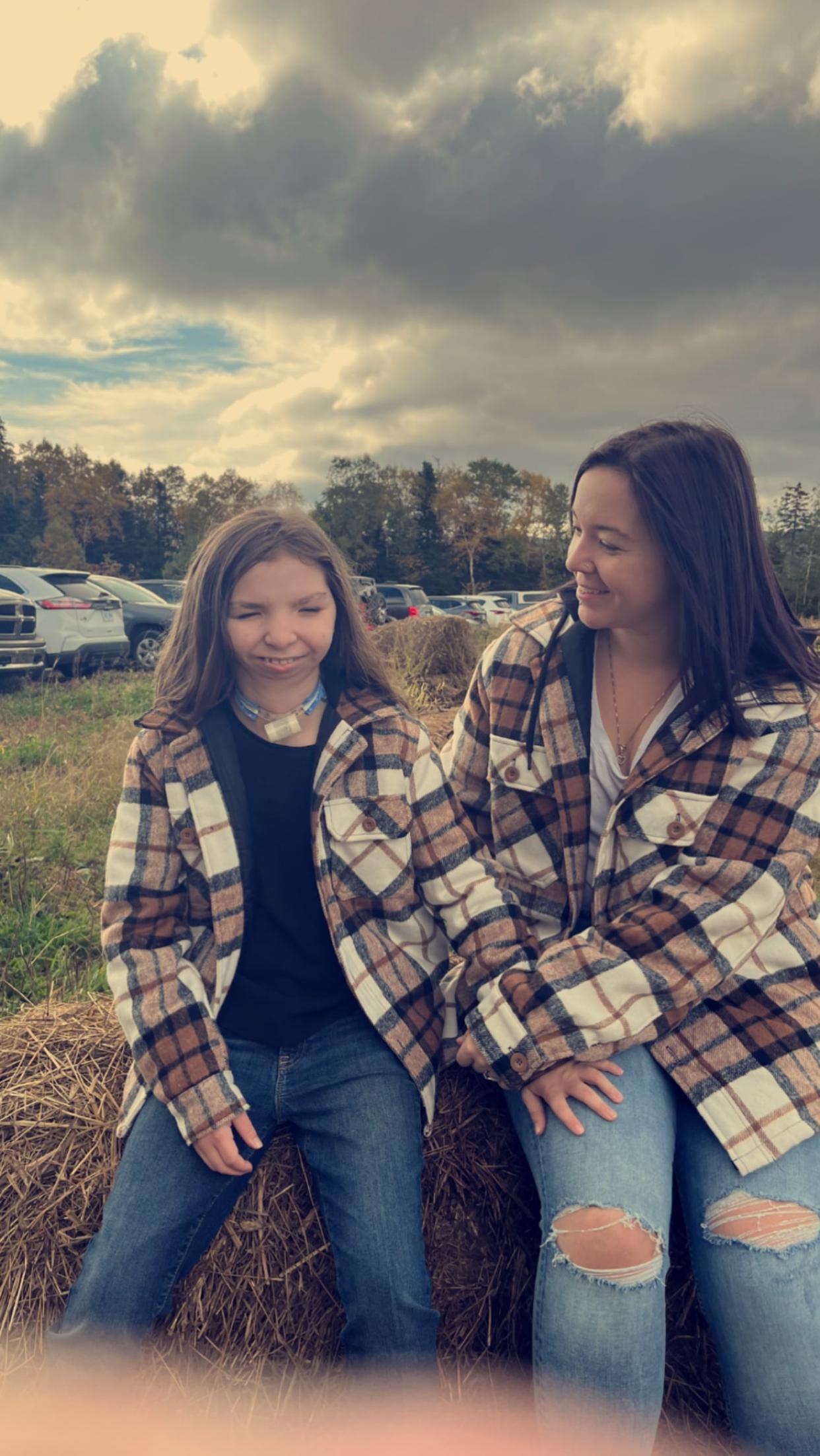 Samantha Brown is a mother from Corner Brook who says her daughter Lilly, who is deaf, is falling behind and isolated in school due to inadequate ASL supports.  (Submitted by Samantha Brown - image credit)