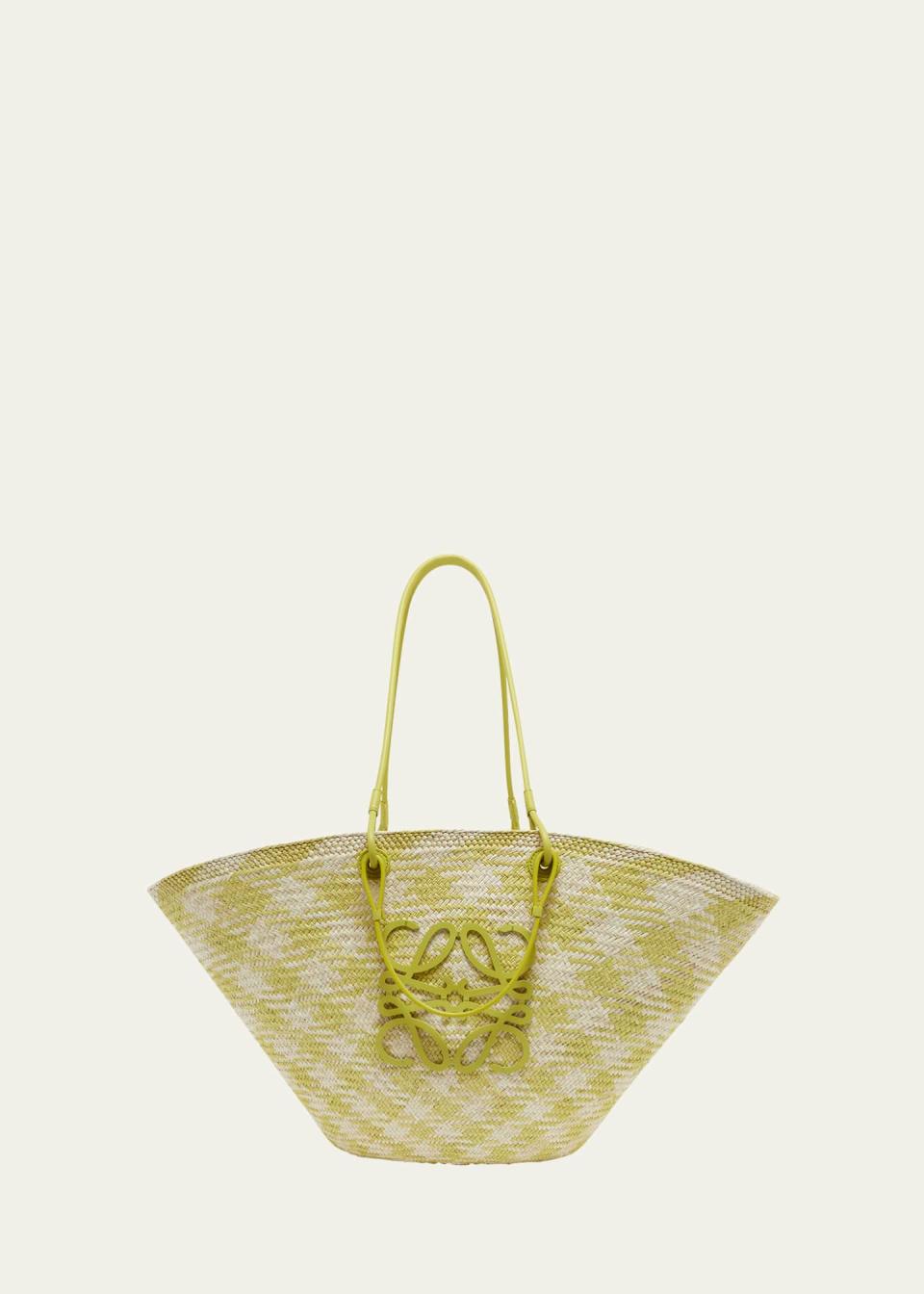 <p><a href="https://go.redirectingat.com?id=74968X1596630&url=https%3A%2F%2Fwww.bergdorfgoodman.com%2Fp%2Floewe-large-anagram-basket-tote-bag-in-checkered-iraca-palm-prod187110080&sref=https%3A%2F%2Fwww.harpersbazaar.com%2Ffashion%2Ftrends%2Fg44094770%2Fbest-beach-bags-beach-totes%2F" rel="nofollow noopener" target="_blank" data-ylk="slk:Shop Now;elm:context_link;itc:0;sec:content-canvas" class="link ">Shop Now</a></p><p>Large Anagram Basket Tote Bag</p><p>bergdorfgoodman.com</p><p>$1350.00</p><span class="copyright">bergdorfgoodman.com</span>