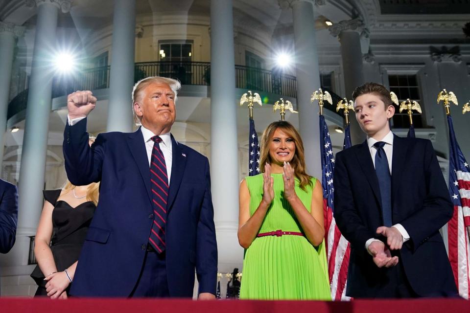 President Donald Trump, first lady Melania Trump and Barron Trump stand on the South Lawn of the White House on the fourth day of the Republican National Convention (AP)