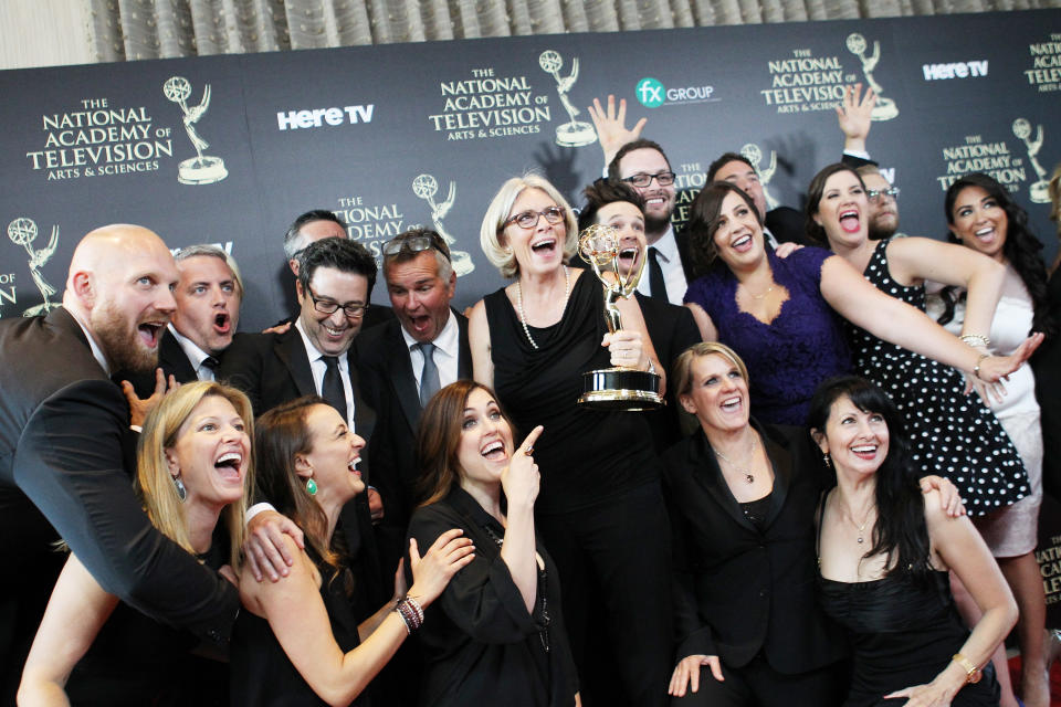 The crew on The Ellen DeGeneres show celebrate an award win