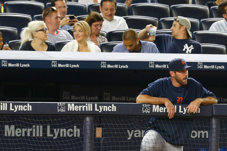 <p>Kate Upton attends the game against the New York Yankees as Justin Verlander looks on from the bench at Yankee Stadium on August 4, 2014 in the Bronx borough of New York City. (Photo by Mike Stobe/Getty Images) </p>