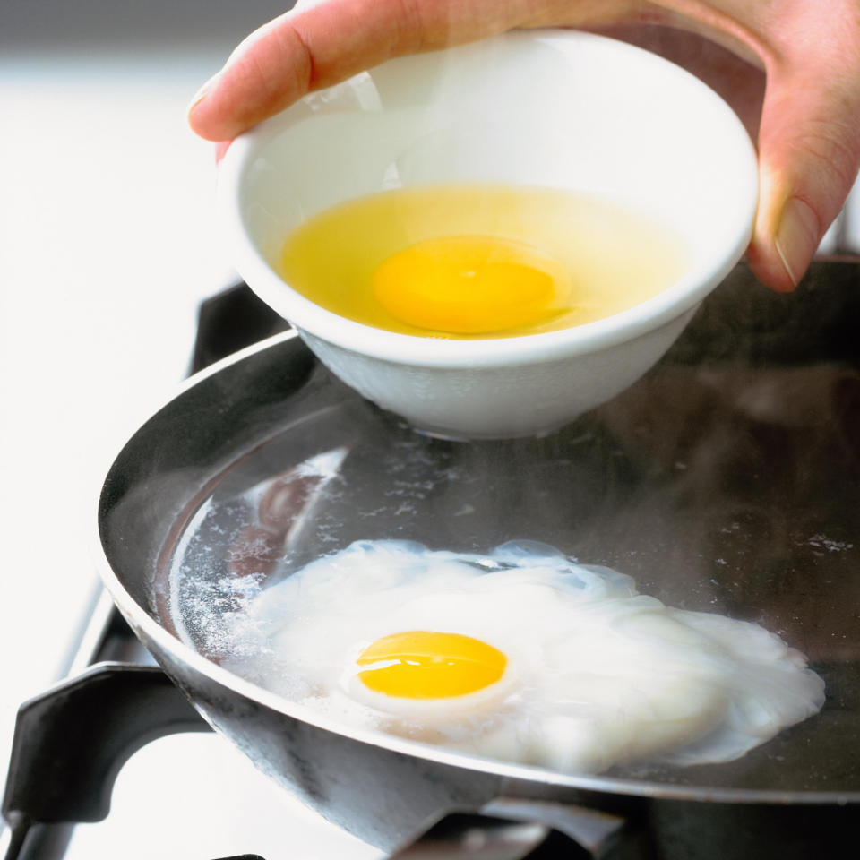 Eggs being poached in frying pan (Getty Images stock)