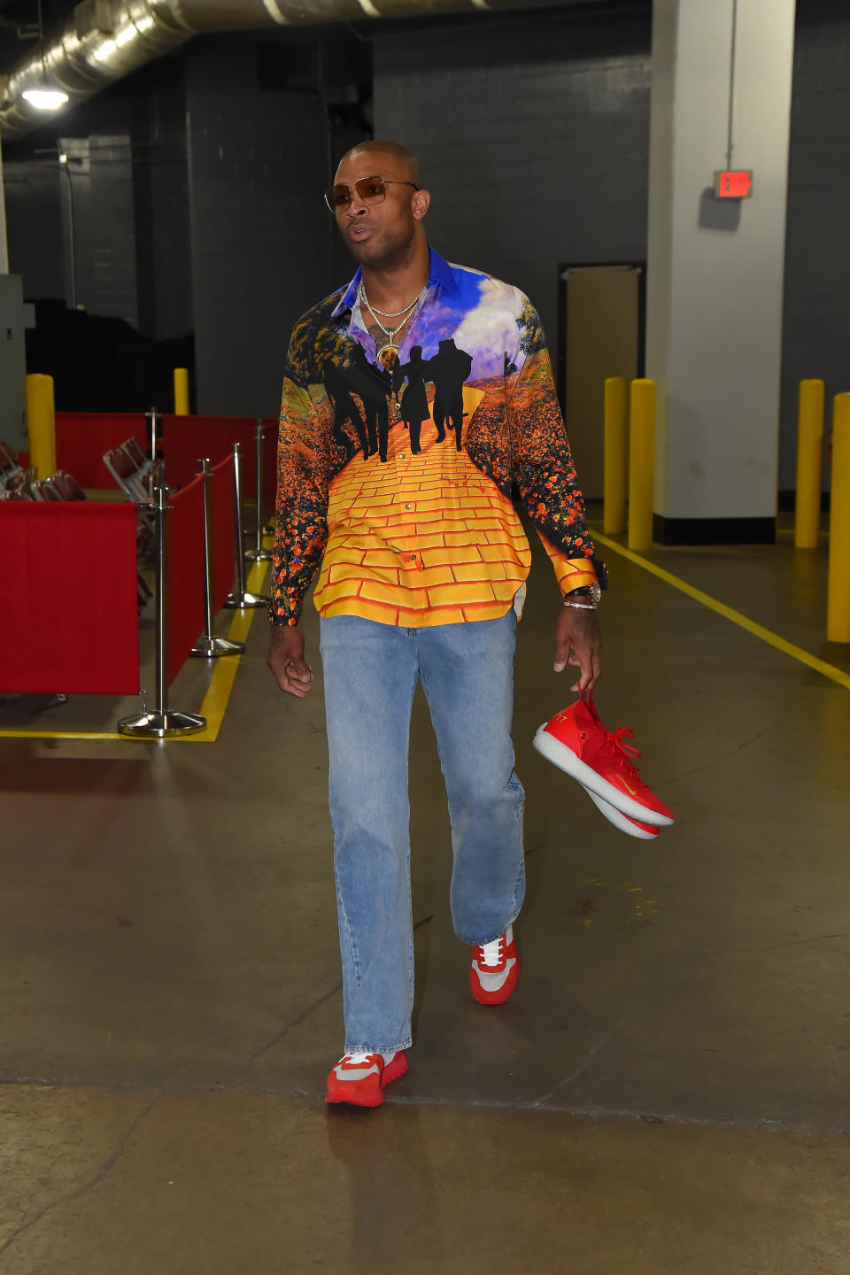 PJ Tucker wears a Louis Vuitton by Virgil Abloh SS2019 yellow brick road shirt before Game 1 on April 14.