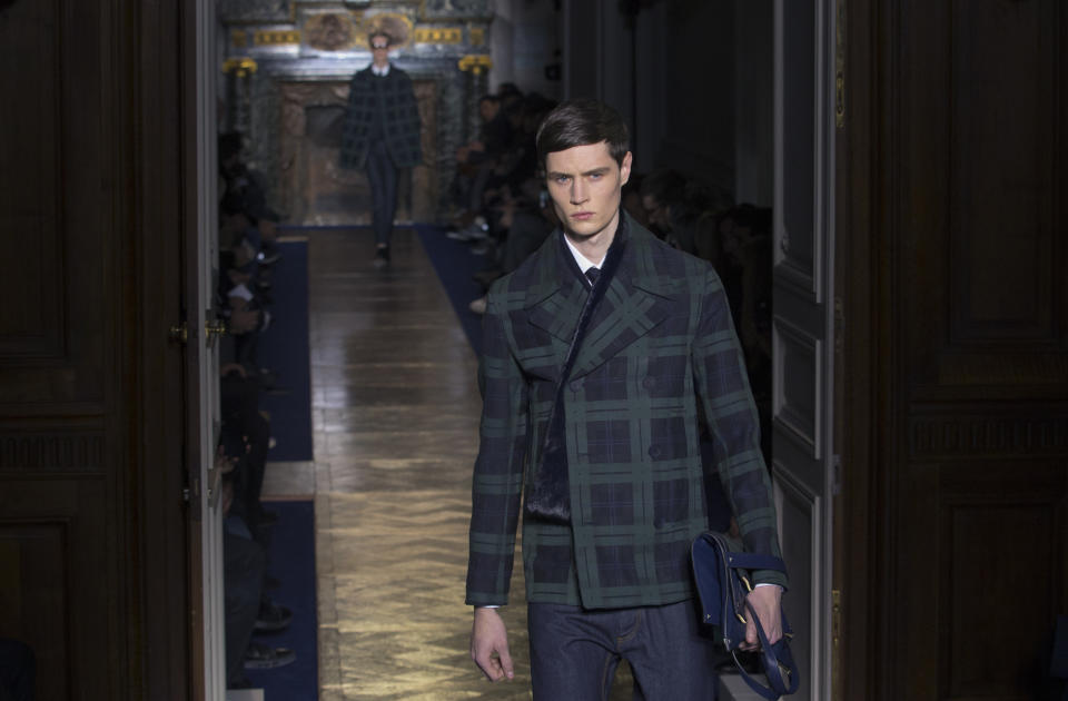 A model wears a creation by fashion designers Maria Grazia Chiuri and Pier Paolo Piccioli for Valentino, as part of their presentation for the men's Spring Summer 2013 Haute Couture fashion collection presented in Paris, Wednesday, Jan. 16 2013. (AP Photo/ Jacques Brinon)