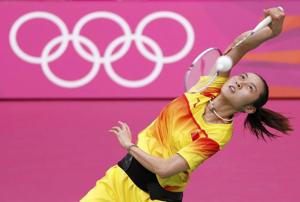 China's Wang Yihan returns a shot to compatriot Li Xuerui during their women's singles badminton gold medal match at the London 2012 Olympic Games at the Wembley Arena August 4, 2012. REUTERS/Bazuki Muhammad (BRITAIN - Tags: SPORT BADMINTON OLYMPICS TPX IMAGES OF THE DAY)