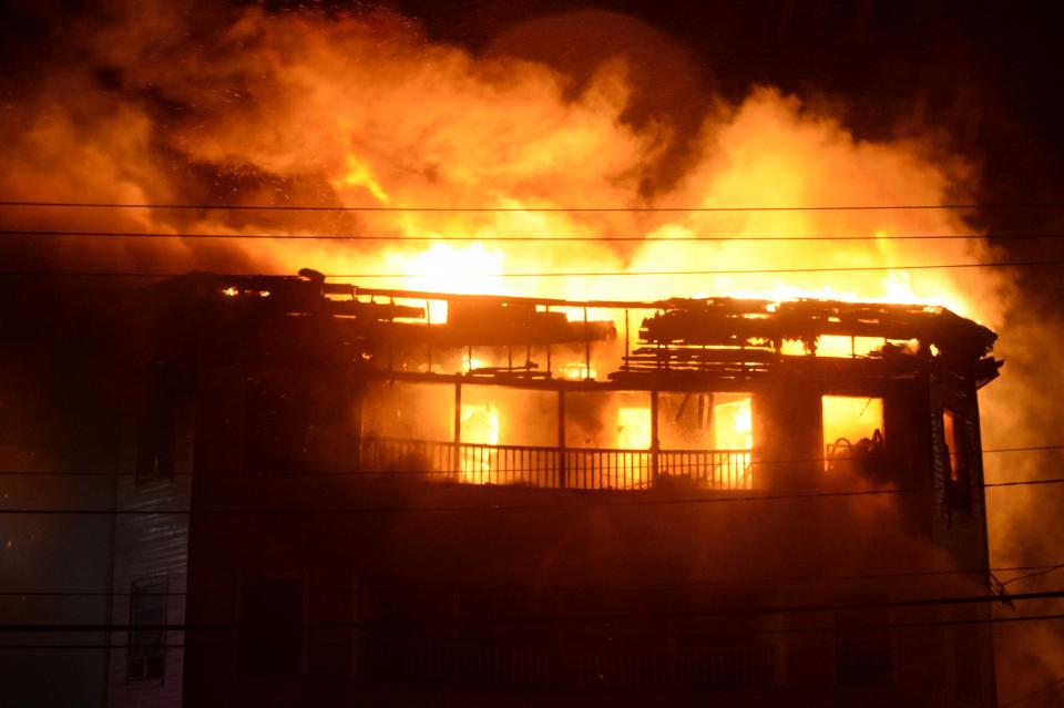 Brockton firefighters battled a three-alarm fire at 312 North Main St. amid a nor'easter that brought heavy winds and rain on Wednesday, Oct. 27, 2021.