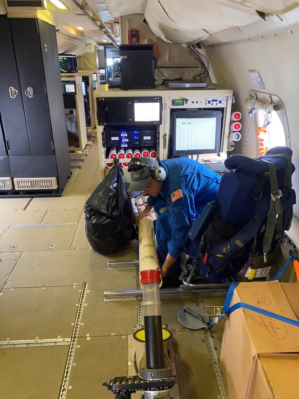 A NOAA technician deploys an airborne expendable bathythermograph. <a href="https://www.omao.noaa.gov/learn/aircraft-operations/media/images" rel="nofollow noopener" target="_blank" data-ylk="slk:Paul Chang/NOAA;elm:context_link;itc:0;sec:content-canvas" class="link ">Paul Chang/NOAA</a>