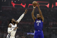 Los Angeles Clippers' Kawhi Leonard (2) shoots over Memphis Grizzlies' Jae Crowder during the first half of an NBA basketball game Saturday, Jan. 4, 2020, in Los Angeles. (AP Photo/Marcio Jose Sanchez)