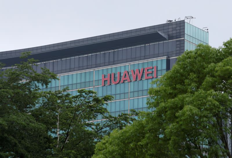 FILE PHOTO: A Huawei logo is seen on the side of a building at the headquarters in Shenzhen