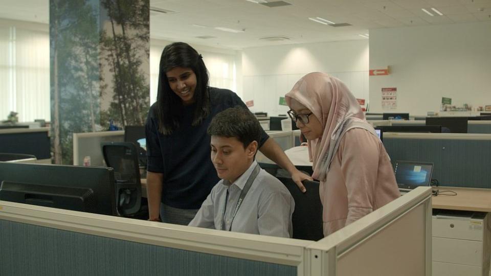 Working with Shell Malaysia employees from different parts of the country has helped Shehzada Shariff (centre) to grow as a working professional. — Picture courtesy of Shell Malaysia