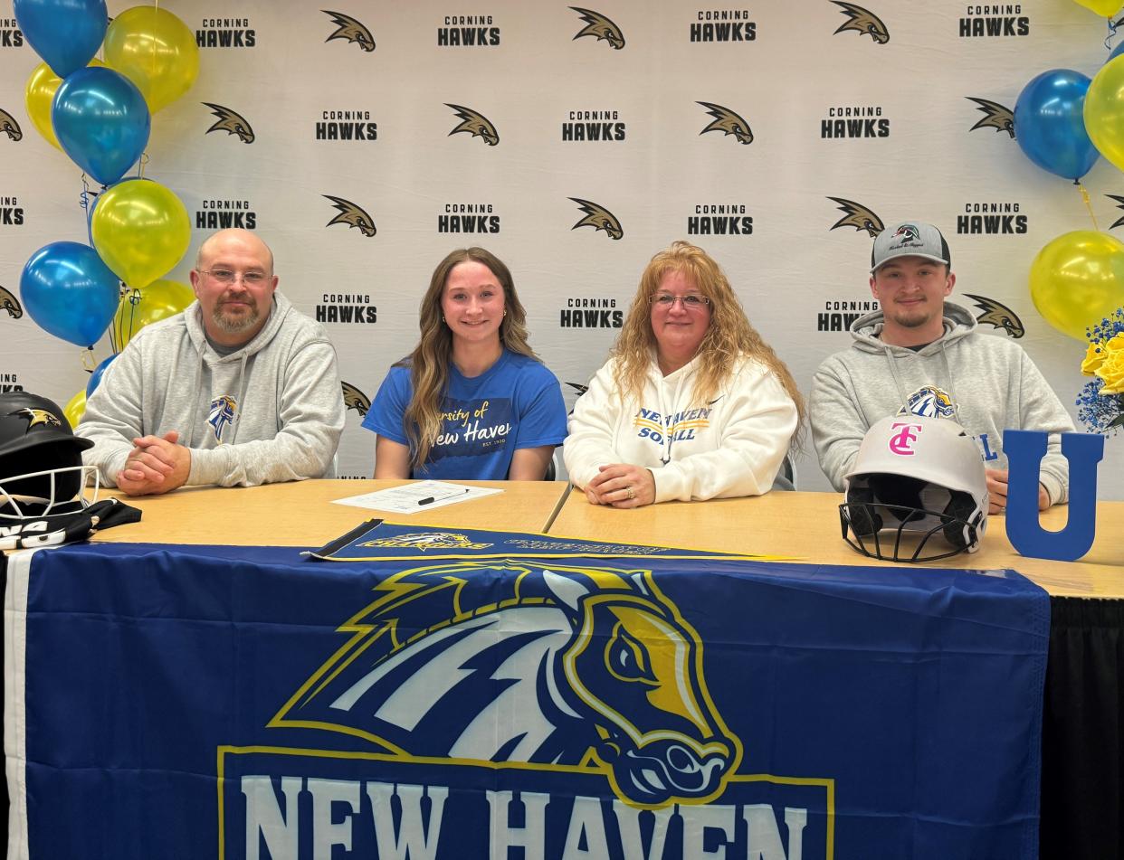 Corning-Painted Post senior Peyton Sullivan during a signing ceremony celebrating her decision to play softball at the University of New Haven. Alongside her are her parents, William and Millisa Sullivan, and her older brother, Jacob Sullivan.