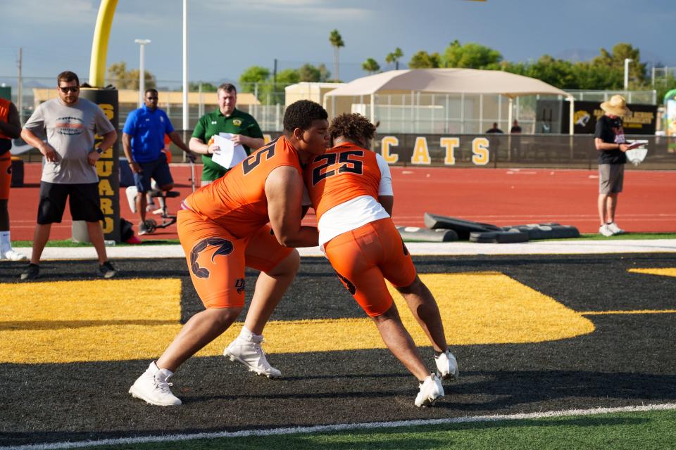 Jalayne Miller (75) runs through drills with his team at the Spring Showcase, hosted at Saguaro High School in Scottsdale on May 18, 2023.