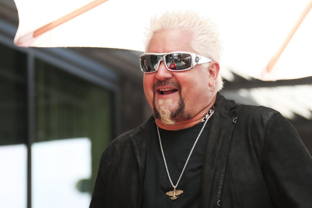 Guy Fieri wearing sunglasses