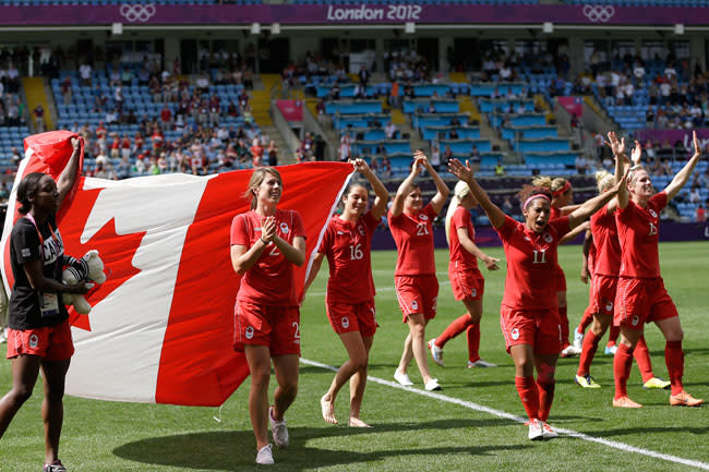 Team Canada celebrates bronze medal win in women's soccer at the Olympics