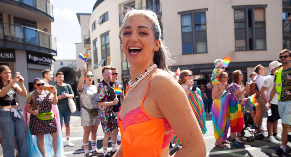 Presenter Harriet Rose marched at the head of the parade in Brighton for her 'first ever Pride. (Image Adiam Yemane)