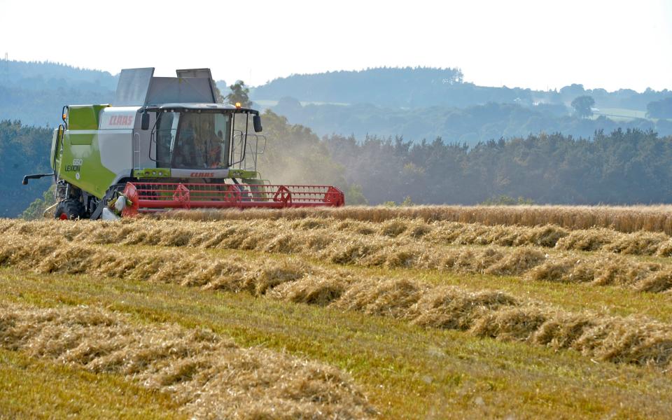 A combine harvester - Credit: Owen Humphreys/PA