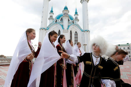 Russian children attend a cultural event at the Kremlin historic citadel of Tatarstan on Kazan, Russia June 15, 2018. REUTERS/Jorge Silva