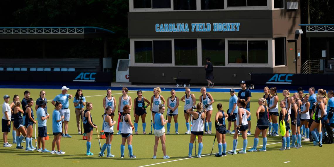 North Carolina field hockey coach Erin Matson talks with her team following their first day of practice on Wednesday August 9, 2023 at Karen Shelton Stadium in Chapel Hill, N.C.