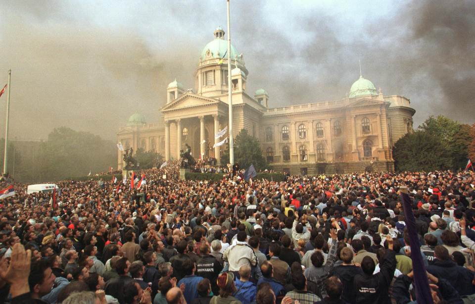 Demonstrators disputing the recent election results clash with police outside the Belgrade Parliament, 5th October 2000. Yugoslavian President, Slobodan Milosevic resigned two days later.<span class="copyright">Yannis Kontos—Sygma/Getty Images</span>