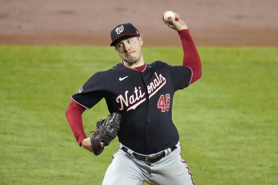 Washington Nationals starting pitcher Patrick Corbin throws a pitch to the Baltimore Orioles during the second inning of a baseball game, Saturday, Aug. 15, 2020, in Baltimore. (AP Photo/Julio Cortez)