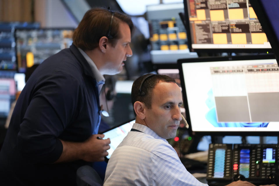 Traders work on the floor at the New York Stock Exchange in New York, Wednesday, May 1, 2024. (AP Photo/Seth Wenig)