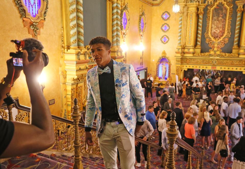 Stow-Munroe Falls' Xavier Preston is interviewed on the grand staircase of the Civic Theatre prior to the start of the High School Sports All-Star Awards ceremony in Akron on Friday. Preston was named Greater Akron Male Athlete of the Year.