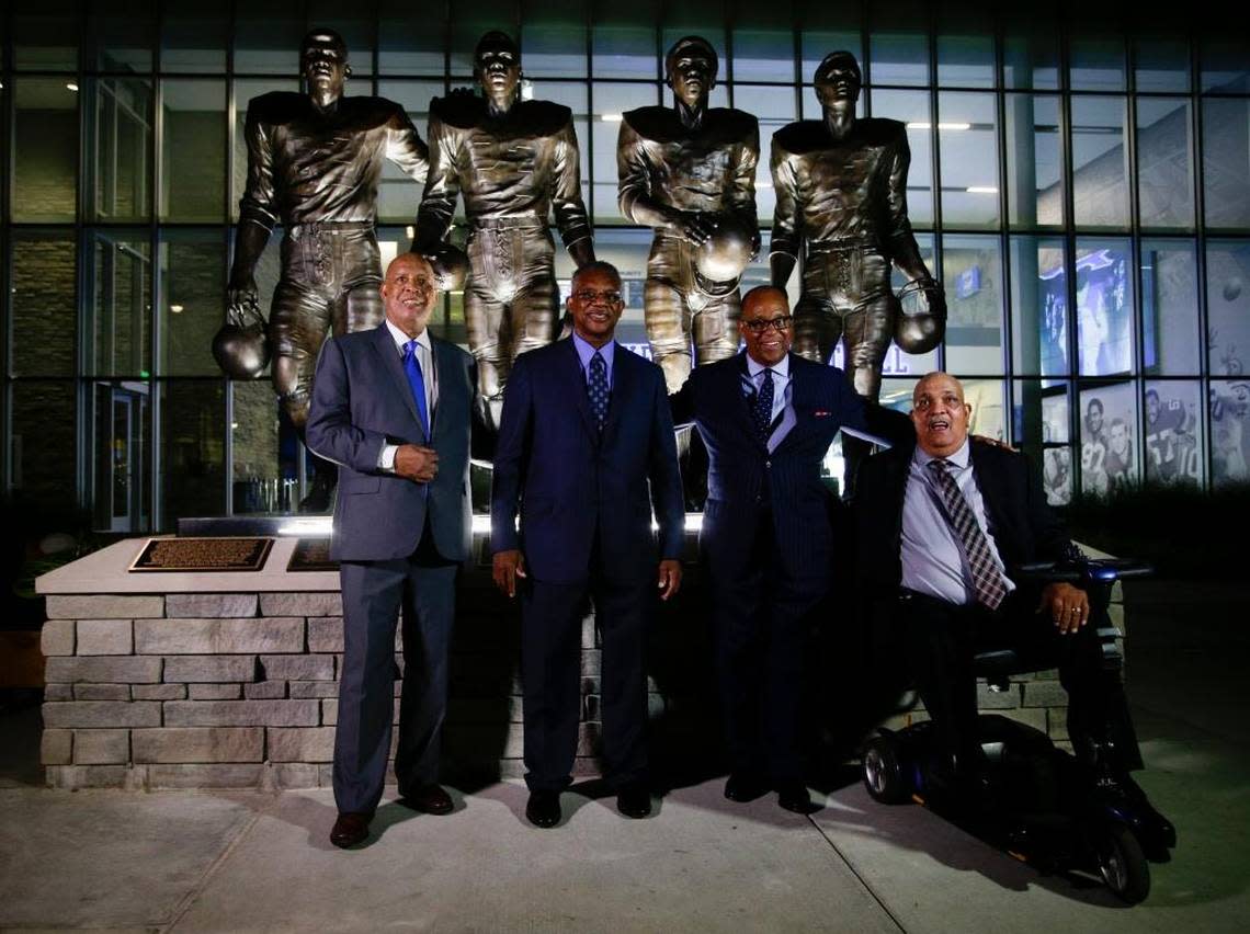 In 2016, the University of Kentucky unveiled statues honoring the four football players who broke the SEC color barrier from left: Mel Page, representing his late brother Greg Page; Nate Northington; Wilbur Hackett and Houston Hogg.