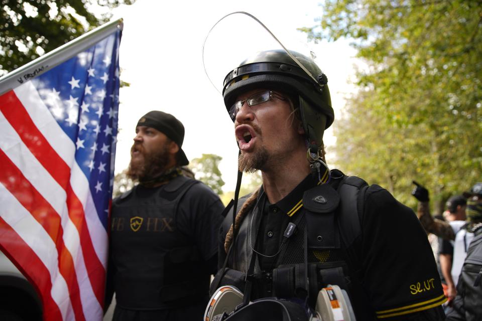 Members of the Proud Boys and other right-wing demonstrators rally on Saturday, Sept. 26, 2020, in Portland, Ore. (AP Photo/Allison Dinner) (ASSOCIATED PRESS)