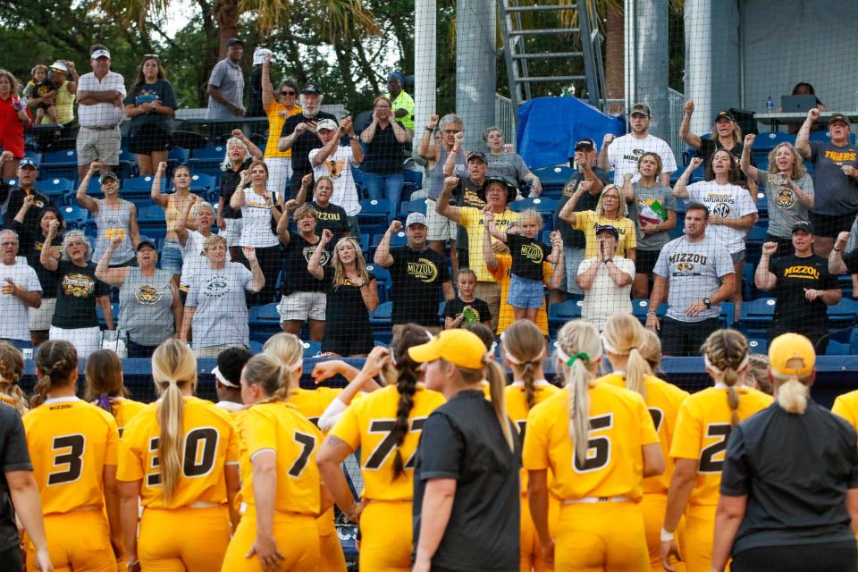 Missouri fans cheer on their team after the SEC championship game against Arkansas on Saturday at Katie Seashole Pressly Stadium in Gainesville, Fla.