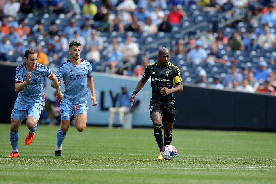 Jun 17, 2023; New York, New York, USA; Columbus Crew SC midfielder Darlington Nagbe (6) controls the ball against New York City FC midfielders James Sands (6) and Alfredo Morales (7) during the first half at Yankee Stadium. Mandatory Credit: Brad Penner-USA TODAY Sports