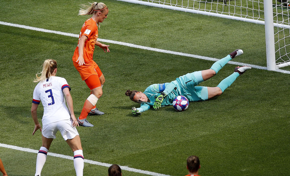 Netherlands goalkeeper Sari Van Veenendaal, right, makes a safe during the Women's World Cup final soccer match between US and The Netherlands at the Stade de Lyon in Decines, outside Lyon, France, Sunday, July 7, 2019. (AP Photo/Francois Mori)