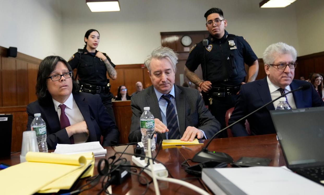 <span>Memorabilia seller Edward Kosinski, left, ex-Rock and Roll Hall of Fame curator Craig Inciardi, center, and rare-book dealer Glenn Horowitz sit in court in New York.</span><span>Photograph: Mary Altaffer/AP</span>