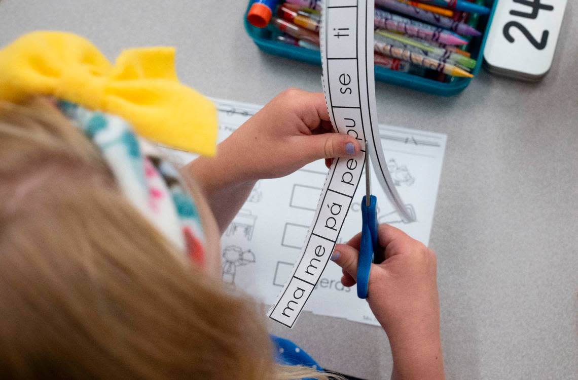 A kindergarten student works on a lesson to learn Spanish syllables in the dual-language immersion program at Quarry Trail Elementary School in Rocklin on Friday, Sept. 16, 2022.