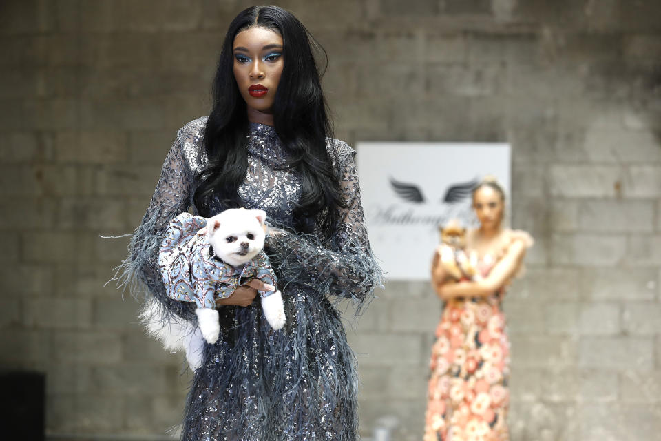 Dogs and models during the Anthony Rubio's Women's Wear Canine Couture show on Feb. 12, 2021.